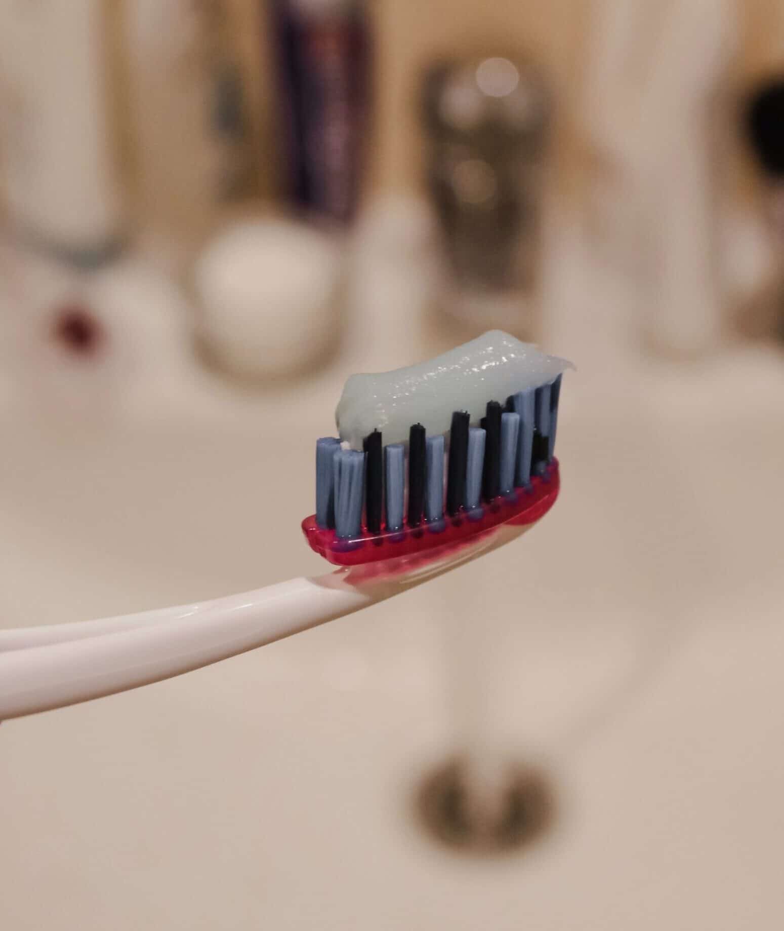 Toothbrush with toothpaste on top