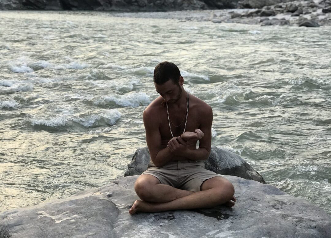 Dylan Smith feeling his pulse in Ganges